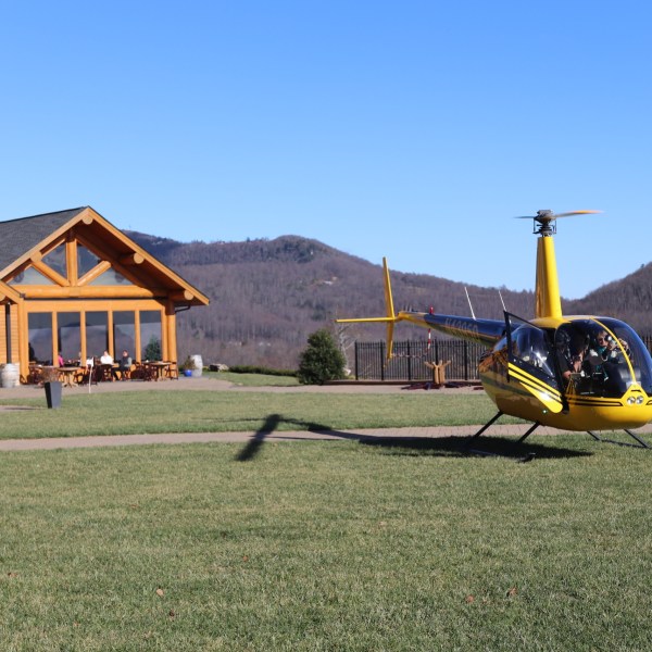 a plane sitting on top of a grass covered field