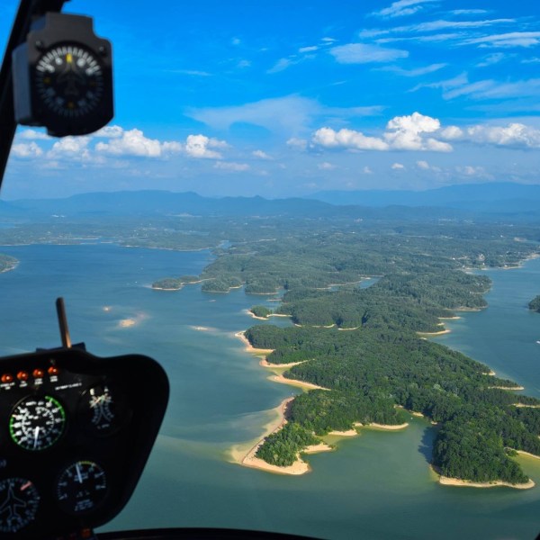 a view of a body of water with a mountain in the background