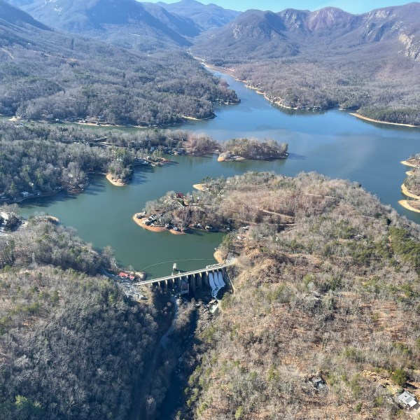 a view of a body of water with a mountain in the background
